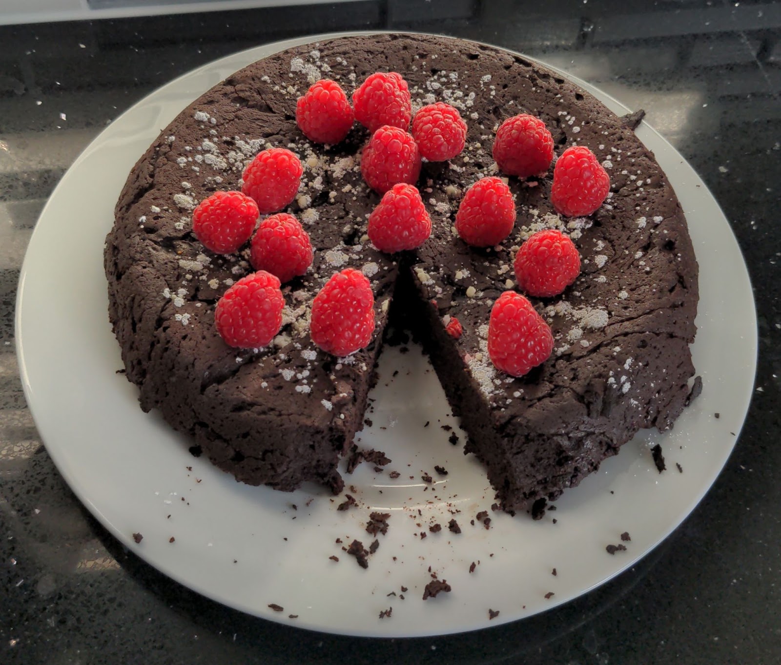 Chocolate cake with raspberries.